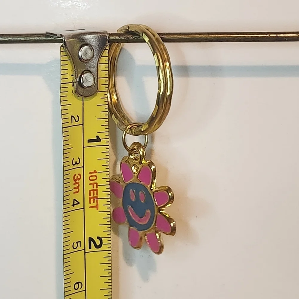 2” Unbranded Smiley Face Pink and Blue Flower Keychain